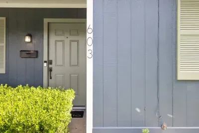 Approach the home through the exterior front, showcasing beautiful landscaping and a welcoming entrance. The charming façade and well-maintained yard enhance the curb appeal, creating an inviting atmosphere from the moment you arrive.