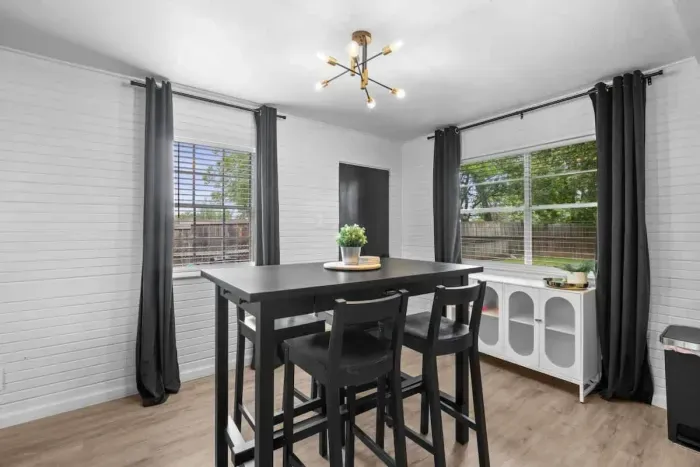 "Enjoy a versatile dining and workspace area, perfect for both meals and productivity. The dining table provides a comfortable spot for family meals, while the dedicated workspace ensures you have a functional area for work or study, all within a wel