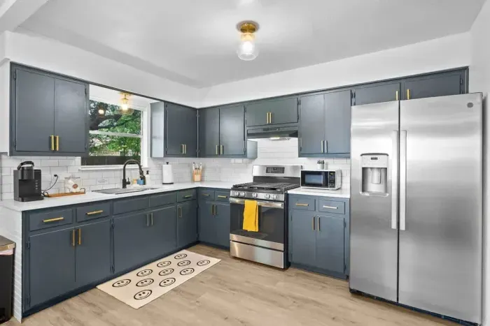 Functional and beautiful, this kitchen comes fully equipped with cookware, utensils, and small appliances.