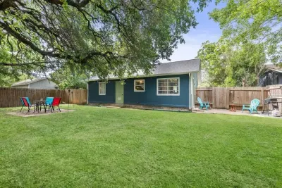 Enjoy the expansive backyard, featuring multiple hangout spaces perfect for relaxation and entertainment. From cozy seating areas to open spaces for activities, this versatile outdoor retreat offers something for everyone to unwind and enjoy.