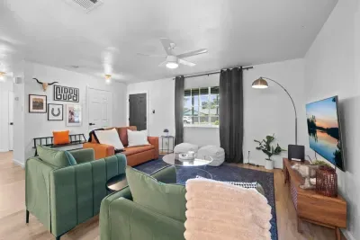 Equipped with a large TV, cozy seating, and space for everyone.