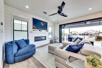 Kick back in a cozy living room with plenty of seating for everyone.