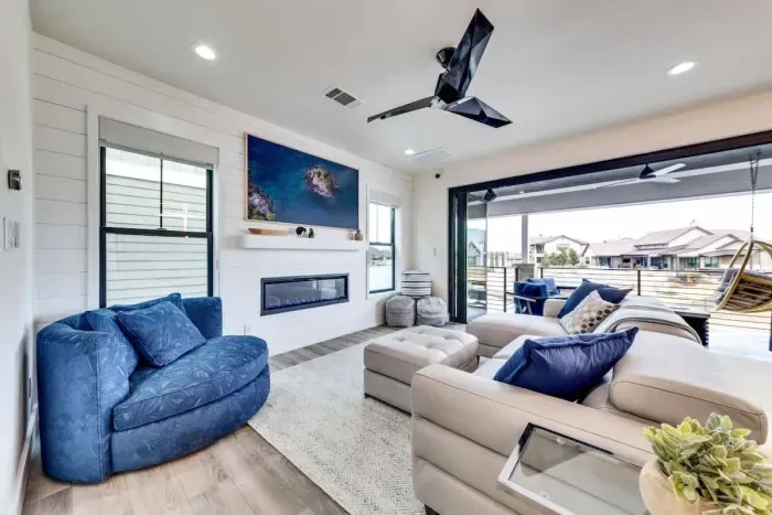 Kick back in a cozy living room with plenty of seating for everyone.