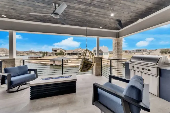 Bright and sunny patio with plenty of space for lounging or enjoying a meal outdoors.