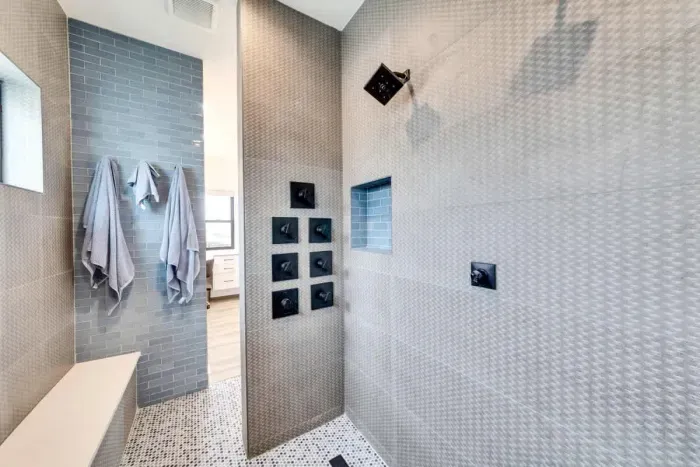 Step into a rainfall shower with endless hot water, ready to recharge you after a day of exploring.