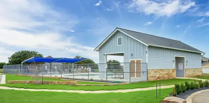 Gorgeous pool area with plenty of seating and shaded area.