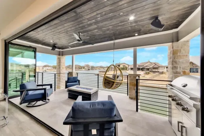 Bright and sunny patio with plenty of space for lounging or enjoying a meal outdoors.