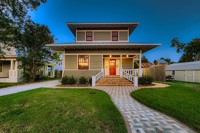 Stunning front exterior at dusk – a picture-perfect welcome.