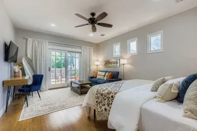 Luxurious master bedroom with access to private sitting area.