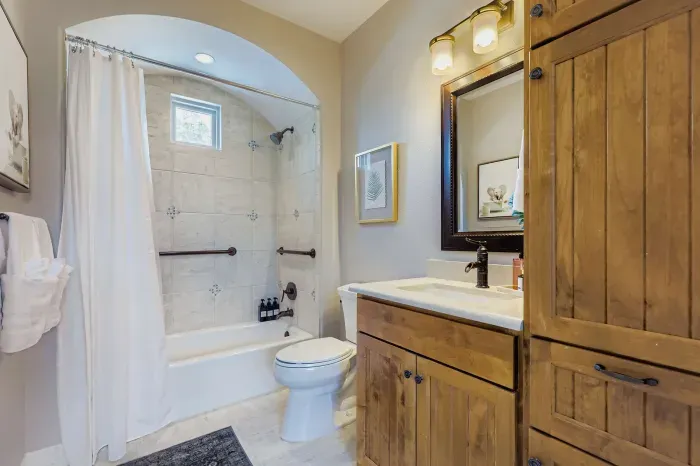 A full third bathroom upstairs - sparkling clean with lots of storage for you and your guests.
