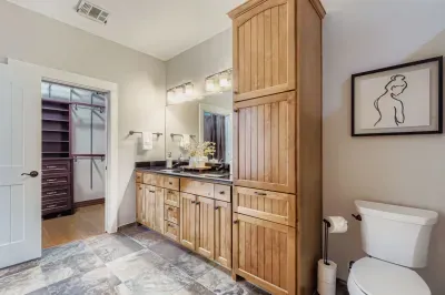 Expansive vanity space with plenty of storage.