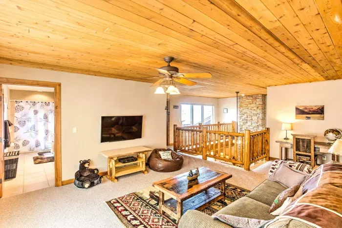 Stylish secondary living room featuring a comfortable sofa, ideal for movie nights or casual gatherings.