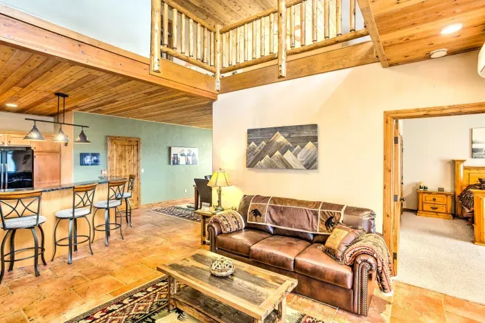 Open-concept living room with seamless flow to the kitchen and dining areas.