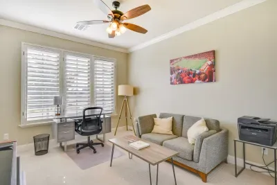 Cozy workspace with plush seating and bright windows.