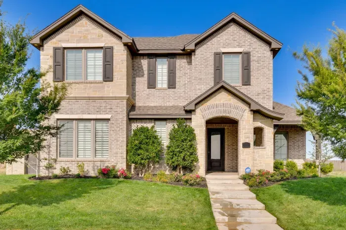 Stunning two-story home with beautiful curb appeal.