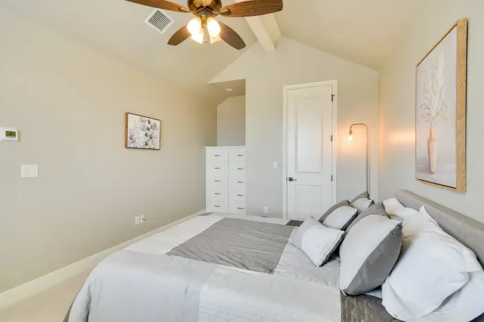 Guest bedroom with queen bed and cozy ambiance.