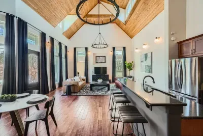 A bright, open-concept kitchen flows seamlessly into the dining area for effortless entertaining.