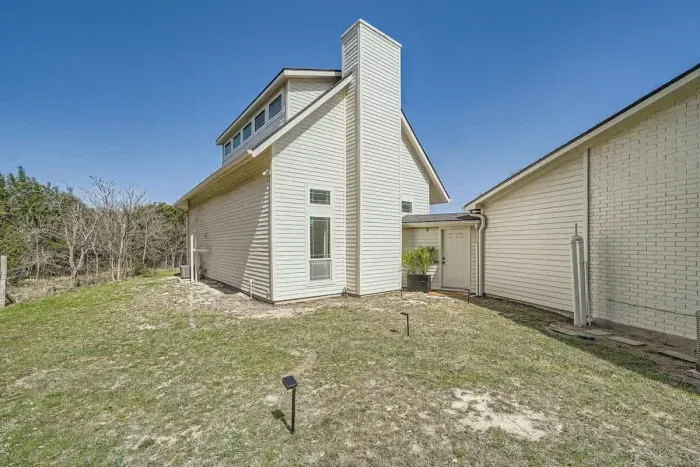 A large front lawn with plenty of space for outdoor games, picnics, or simply soaking up the sunshine.