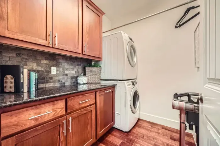 Laundry room with everything you need for longer stays—washer, dryer, and supplies.