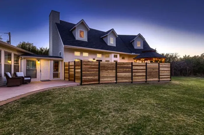 Spacious and beautifully landscaped backyard, ideal for gatherings or quiet relaxation.