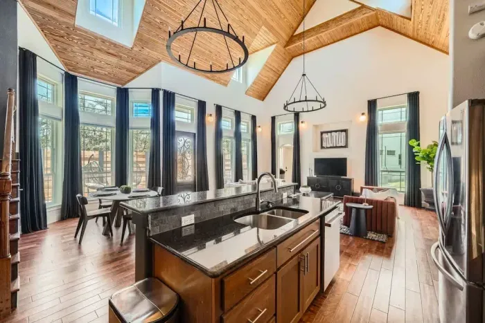 Elegant living space with high ceilings and a beautifully curated design.