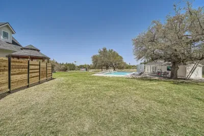 Spacious backyard with plenty of room to play, relax, or enjoy the sunshine.