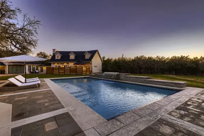 Tranquil poolside retreat with serene countryside views, perfect for unwinding at sunset.  Just let us know if/when you want to use it!