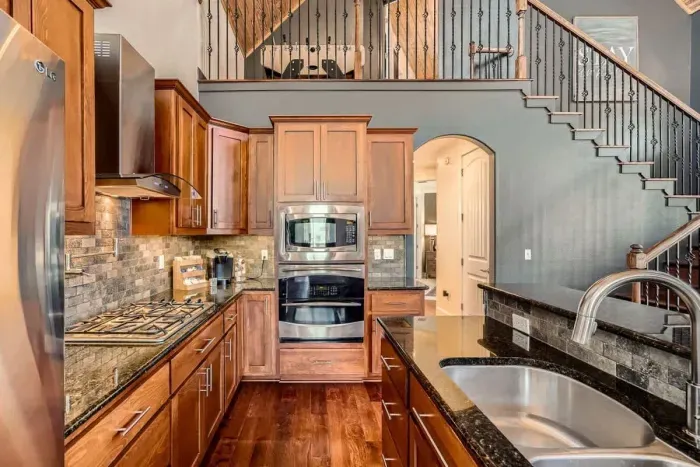 A bright, open-concept kitchen flows seamlessly into the dining area for effortless entertaining.