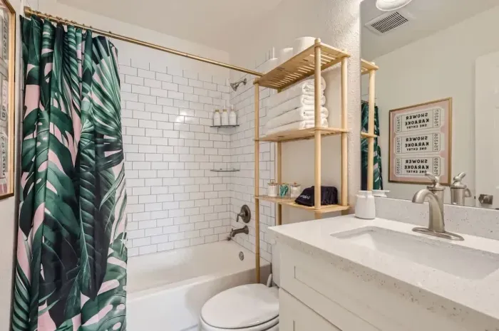 Bright bathroom with subway tile, full vanity, and fresh towels. Stocked with all your daily essentials.