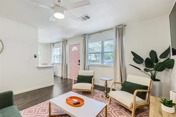 Spacious living area with comfortable couches, perfect for gathering with friends and family.