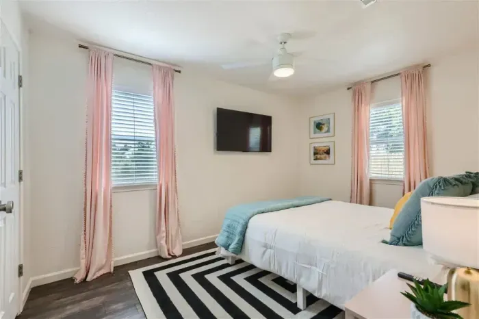 Serene bedroom with calming colors and thoughtfully chosen furnishings