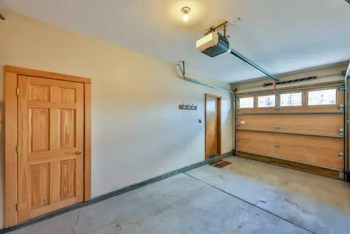 Convenient and spacious garage, offering plenty of room for parking and storage. With easy access and a well-organized layout, it provides a practical space to keep your vehicle safe and store outdoor gear or tools.