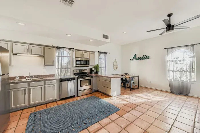 Fully equipped kitchen with appliances.