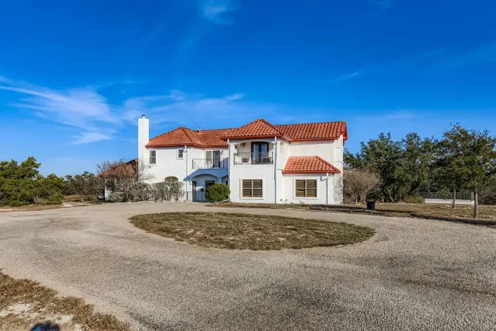 Circular driveway and front approach.
