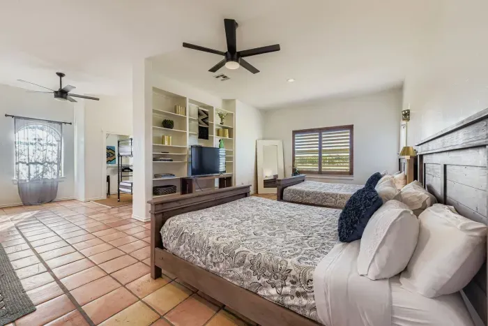 Bedroom with 4 queen beds.