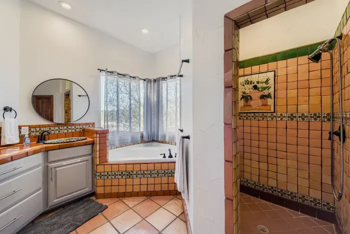 Bathroom with walk in shower.