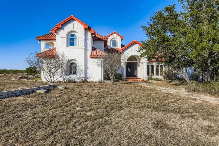 Estate exterior with Hill Country views.