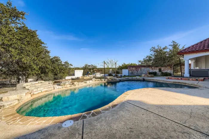 Elevated view of pool and grounds.