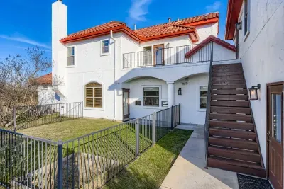 Backyard stairs and upper access.