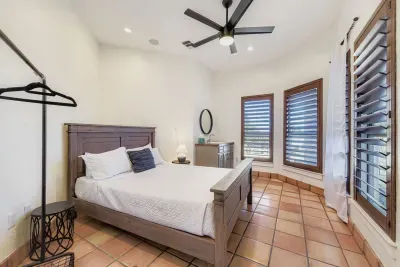 B bedroom with queen bed.