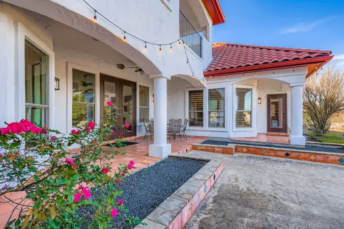 Exterior patio with garden views.