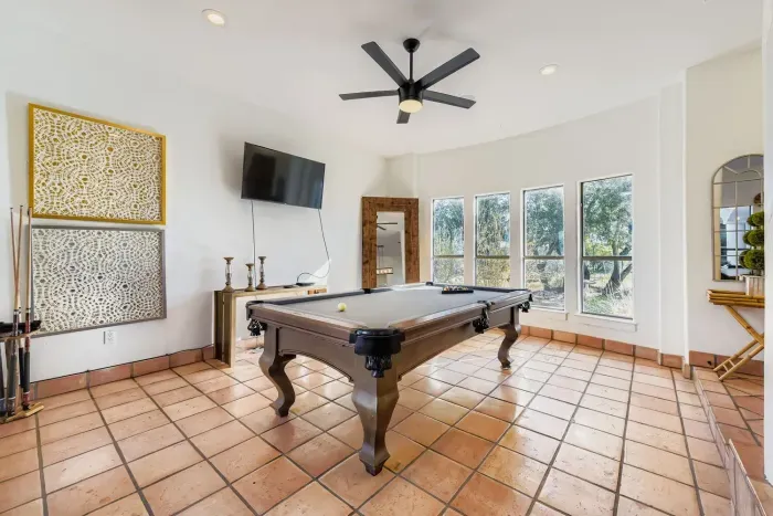 Game room with pool table.