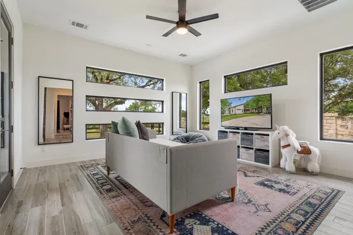 Open and airy playroom, providing extra space for family and guests to gather.
