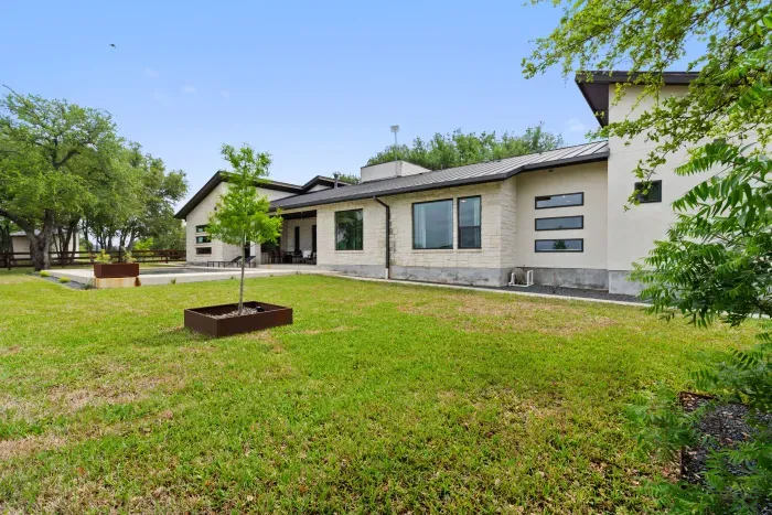 Relax and unwind by the sparkling pool, offering a perfect spot for swimming, lounging, or soaking up the sun. Surrounded by comfortable seating and beautiful landscaping, it's an ideal retreat for outdoor enjoyment.