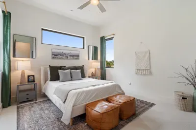 Bedroom 2 with a Queen, and ensuite full bathroom