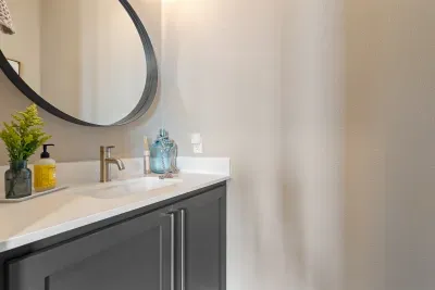 1/2 bathroom conveniently located between the living room, game room, and 2nd/3rd bedrooms.