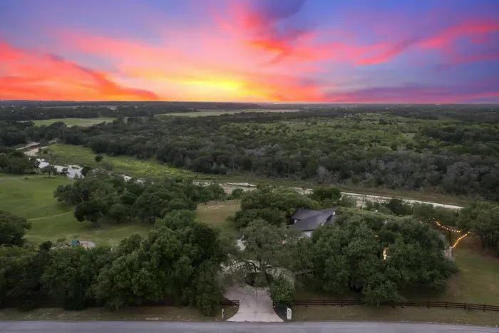 Expansive aerial views of rolling hills and natural landscapes.