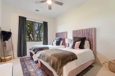 Bedroom 3 with 2 twins and an ensuite bathroom
