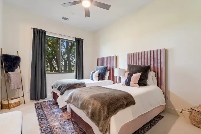 Bedroom 3 with 2 twins and an ensuite bathroom