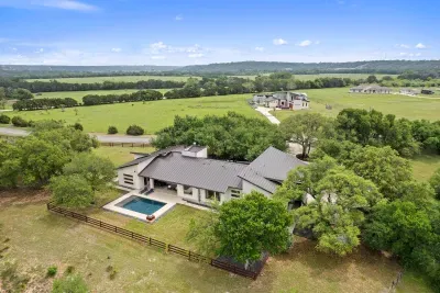 Aerial view showcasing your luxurious getaway nestled in nature.